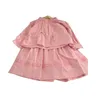 Conjuntos de ropa para niños coreanos, traje rosa de primavera para niñas, camisa de manga larga, estilo de falda, conjunto occidental suelto de dos piezas