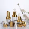 Heet verkopen Clear Glass Lotion Bottle Container voor cosmetisch 20 ml 30 ml 50 ml glazen etherische olievloed met pipetgouden dop