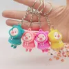 Nyckelringar Cartoon Cute RainCoat Doll Milk Pig Bag Pendant Activity Gift Nyckelring Tillbehör G230525