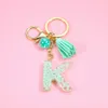 Keychains Fashion Green Bead Jóias femininas A-Z Letter Original acrílico bolsa pingente de chaveiro fofo acessórios G230525