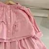 Conjuntos de ropa para niños coreanos, traje rosa de primavera para niñas, camisa de manga larga, estilo de falda, conjunto occidental suelto de dos piezas