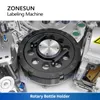 Zonesun自動ホットメルト接着剤ラベル付けマシンスターホイールボップラベル円筒ポンプボトルパッケージZS-CYXR12
