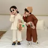 Kledingsets Kinderpak 2023 Autumn Koreaanse stijl jongens en meisjes solide kleur hapsed tracksuit Children Neutral tweedelige trui