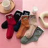 Calcetines de hombre Mujer Bow-Knot Girls Ins Trend Lace Tubo medio Japonés Lindo Otoño e Invierno Pila de algodón para