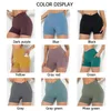 Shorts actifs Sexy croix taille haute Fitness Yoga femmes couleur unie BuLift entraînement course avec poche latérale vêtements de sport pour femmes