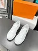 2023 Designer Kvinnor Casual Shoes Italy Lågklippta toppbrev Högkvalitativa sneaker Beige Ebony Canvas Tennis Shoe 1020