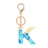 Keychains Lovely Gold Foil Blue Gradient Färgglad hartsbrev A-Z Keychain Men's Handbag Car Keyring Pendant Fashion Jewelry Gift G230525