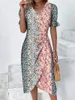 Sukienki swobodne 2023 Summer elegancka damska elegancka v -kecka drukarnia bąbelkowe nieregularne sukienka spódnicy