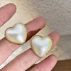 Le donne degli orecchini della vite prigioniera adattano il commercio all'ingrosso dei monili di temperamento della grande perla bianca del cuore di amore 2023