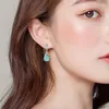 Orecchini pendenti che vendono gioielli con ciondolo a forma di zucca d'acqua blu smeraldo naturale intagliati a mano per accessori moda donna
