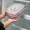 Botellas de almacenamiento 4 Rejillas Caja de frutas para alimentos Compartimiento portátil Refrigerador Contenedor con tapa Recipiente sellado reutilizable