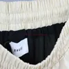 Designer Short Moda Abbigliamento casual Pantaloncini da spiaggia American Rhude Nuova lettera Nastro ricamato Stile piccolo Casual Alla moda Allentato 54 Pantaloncini Colorati Uomo Donna Jog