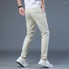 Calças masculinas 2023 Primavera Summer Summer Moda de negócios casuais reta Chaque Khaki azul preto calça de cor sólida PLUS TAMANHO 28-38