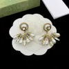 Earring designers design studs for women, luxurious and stylish, gold pearl crystal, gold letter silver jewelry