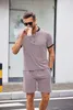 Mens Tracksuits Set Designer Tracksuit Polos Shorts Two-Piece Man Fitness Suit Snabbtorkning och andningsbara sportkläder S M L XL 2XL 3XL SETS