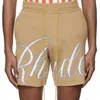 Designer Short Fashion Casual Vêtements Shorts de plage K590 Rhude Lettre Jacquard Cordon de laine tricotée High Street Mode Hommes Femmes Loose Sports Yel