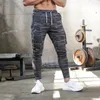 Pantaloni da uomo Uomo Allenamento Camouflage Abbigliamento sportivo super morbido Pantaloni sportivi con cerniera lacci Pantaloni da jogging per l'uso quotidiano