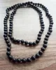 Kedjor matt svart onyx pärla halsband lång sten knutna naturliga män 71 cm