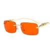 Güneş gözlüğü moda markası klasik açık yaz tasarımcısı vintage dikdörtgen leopar dekorasyon rimless erkekler tasarım metal gözlük kadınları gölgeler güneş gözlükleri
