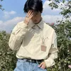 Bloups feminina Tulip Bordoused Corduroy Shirt Men Manga Longa Button Casual Up Camisetas Mulheres Tops American Retro 2023 Toda a temporada coreana