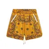 Designer Kort Mode Fritidskläder Strandshorts New Rhude 2023 Vårsommar Herr Brev Broderad Micro Label Capris Casual Lösa Trendiga Shorts Jogge