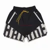 Designer Kort Mode Fritidskläder Strandshorts Rhude American High Street Modemärke Loose Sports Tvåfärgade Patchwork Ränder Beskurna shorts för män Joggare