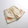 Hot Selling American Kne Length Sports Shorts för herrens sommarkondition som kör lös casual byxor kvartal shortsdpqu