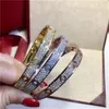Femmes hommes bracelet design bijoux de luxe bracelets en or amour couple bracelet double rangée diamant design de mode processus d'incrustation caché de haute qualité luxueux