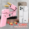 Novo entretenimento Torneiras dobráveis ​​Toys ejeção de shell deformação criativa de deformação criativa Gunas de brinquedo Play Cool Telefone Presente IC380 Pistol 2087