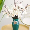 Fiori decorativi 20 teste Bouquet di fiori di seta artificiale Simulazione Pianta di magnolia per la decorazione del soggiorno di casa Matrimonio falso
