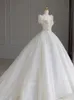 Robe mariée plus taille robe nuptiale longue robe nuptiale brillante en V perles de cou appliqués plage de dentelle personnalisée