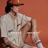 Designermodekläder T-shirts T-shirt Korrekt Rhude Kortärmad Mclaren Co Namnbokstav Broderi Knapp Amerikansk Lapel Pikétröja Manlig Bomulls Streetwear Toppar Cas