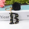 Halloween Acrylic Flower Pattern A-Z English Letter Keychain With Black Fur Ball Retro Girls Black Initial Key Ring Bag Ornament