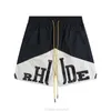 Ontwerper Korte Mode Vrijetijdskleding Strandshorts Rhude Patchwork Kleurcontrast Letter Gedrukt Capri Rechte Touw High Street Zomer Losse Tu