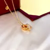 Collane di diamanti per donne a catena d'argento alla moda anello ellittico ad interblocco a pendente a pendente incorporato incorporato in acciaio in acciaio di titanio gioielli piccole collane