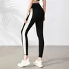 Pantaloni attivi Europa e Stati Uniti Elastic Yoga Cuciture ad asciugatura rapida da donna Running Fitness Vita alta Hip Tight