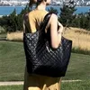 Zwarte Duffel Bags ICARE Maxi Tote Shopping Bags Luxury bakken tas topkwaliteit grote mode echt lederen vrouwen handtas handtas handtassen gewatteerde lambskin spul zakken