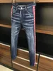 Dsquad2 dżinsy luksusowe designer dżinsowe dżinsy perforowane spodnie dsquare dżinsy swobodne modne spodnie dsquad2 Ubranie męskie rozmiar 28-38 9711