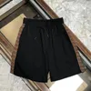 Men's Shorts 2023 New pants fashion tide brand beach pants Italian designer loose sports fashion High Quality casual printing lace-up pant