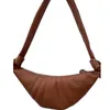 2022 new small crowd can sing cow horn bag, leather armpit wide band chest bag, dumpling bag, one shoulder cross body French stick women's bag 230529