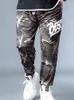 Pantalons pour hommes Pantalons de sport pour hommes 7XL Camouflage en soie glacée Été Grande taille Petits pieds Mec mince