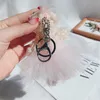 Belangrijkste ringen Exquise trouwjurk beer dames schattige dieren pluche pop sleutelhanger houder Koreaanse modezak charme hanger cadeau g230526