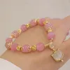 Charm-Armbänder, rosa Opal-Anhänger, Perlenarmband, Qiu Dong, weiblich, Ins-Temperament, kontrahierte Schnur auf dem Stil