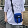 Bolsas de la compra Bolsa de mensajero Hombro Estilo de Hong Kong Pequeño cuadrado Tide Cool Tooling Personalidad Cerradura de mortaja Estudiante Lona