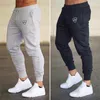 Calças 2018 homens ginásios calças compridas meados de algodão esportivo treino de fitness calças casuais moda moletom jogger pant calças magras