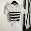 Knitted Women Tees Metal Button Projektanci damski dzianiny w paski z krótkim rękawem dla kobiet