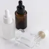 Flacone di vetro da 30 ml a spalla piatta smerigliato/trasparente/ambrato rotondo flacone contagocce di siero di olio essenziale flaconi cosmetici vuoti portatili