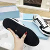 Designer Sneakers De Luxe Skate Chaussures Mode Femmes Chaussure De Sport Running Prad Sneaker Nouveau Formateur Femmes Hommes sdfxcv