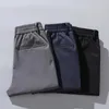 Pantalons pour hommes printemps été hommes Stretch coréen décontracté Slim Fit taille élastique survêtement affaires classique pantalon mâle mince taille 28-38