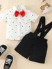 Kledingsets RuiBbwan Toddler Kids Baby Boys 2pcs Gentleman Outfits Kort Mouw Button Down Bowtie Shirt Top Suspender Shorts Summer